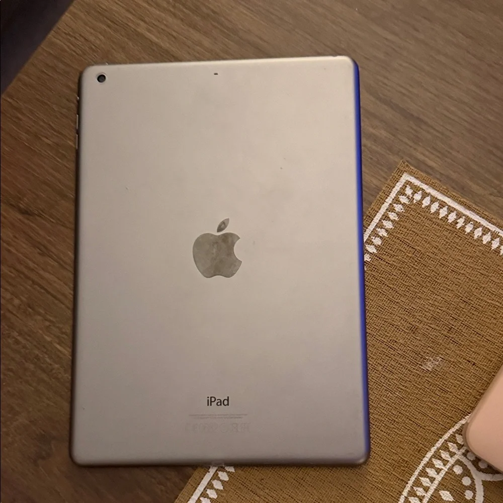Just part blocked Apple Tablet with Black Frame